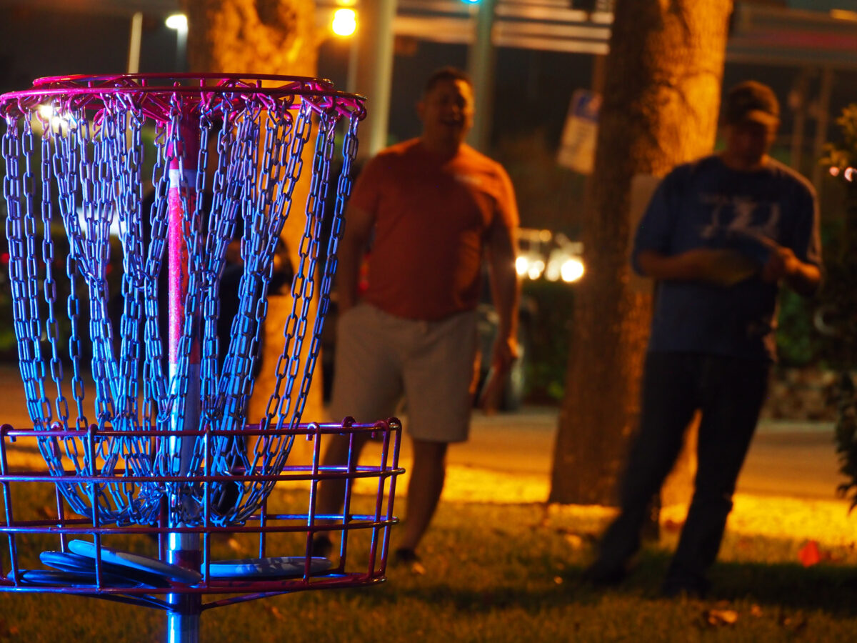 lighting up a disc golf basket at night