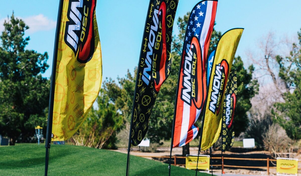 Look for wind indicators on the course like basket flags and feathers like these if available.