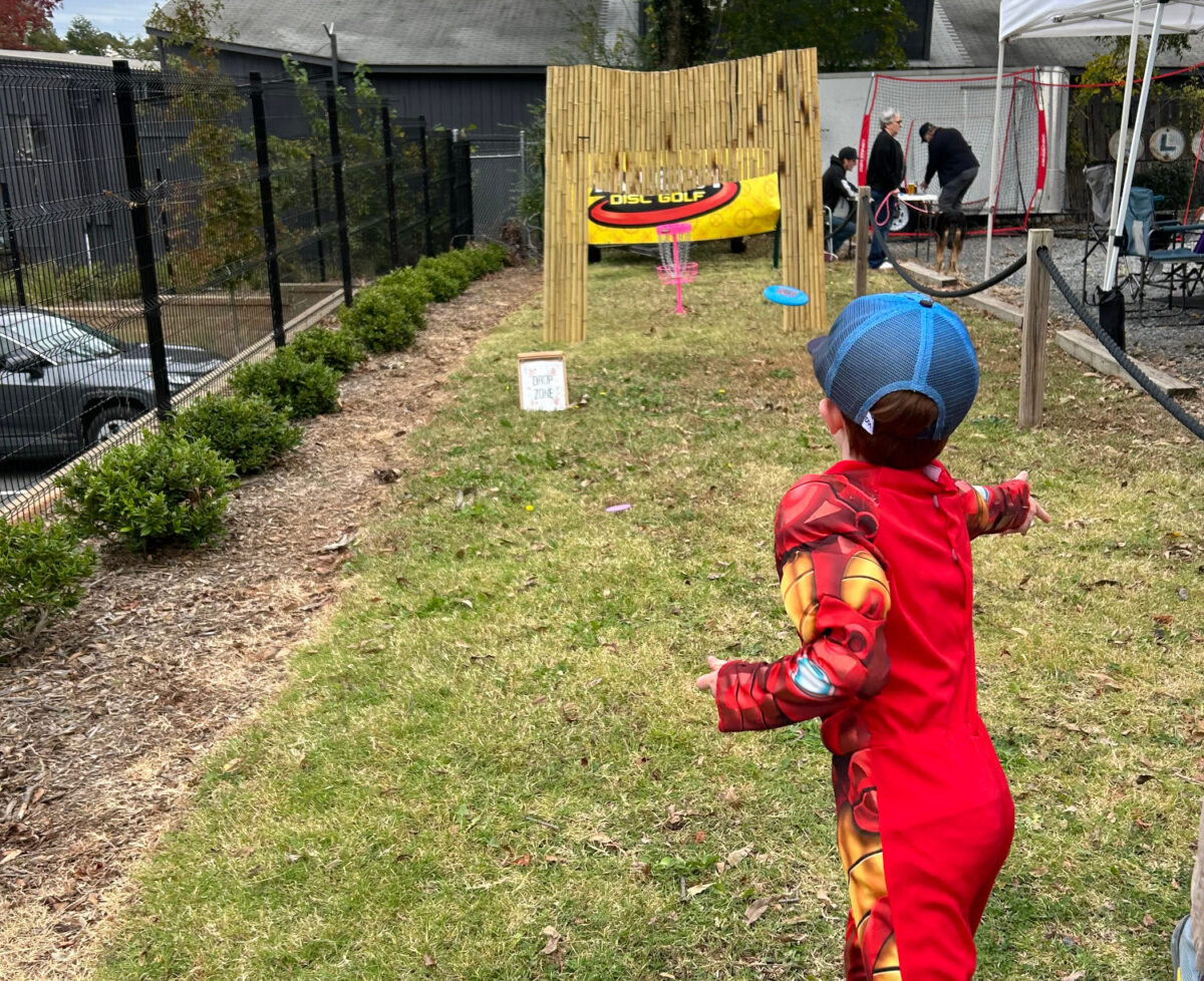 Competitor playing in mini disc golf event.