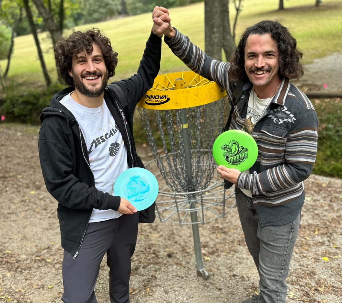 Jeff Arevalo and Sam Grisman playing a round of disc golf